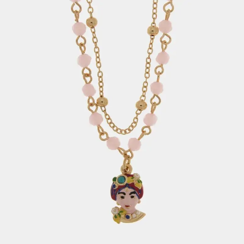 Collana in metallo con testa di moro e perle rosa | Rohome