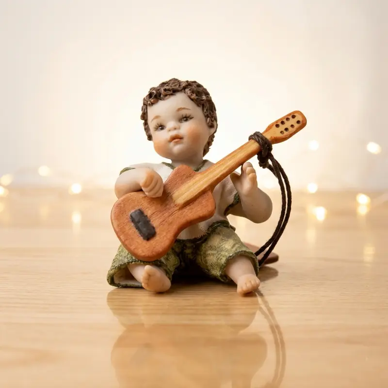Sibania Statuina Ceramica Eddie con Chitarra H 5.5 Cm
